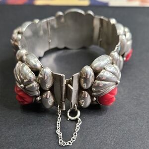 Vintage Taxco Mexican Sterling Silver. With Carved Red Coral Faces